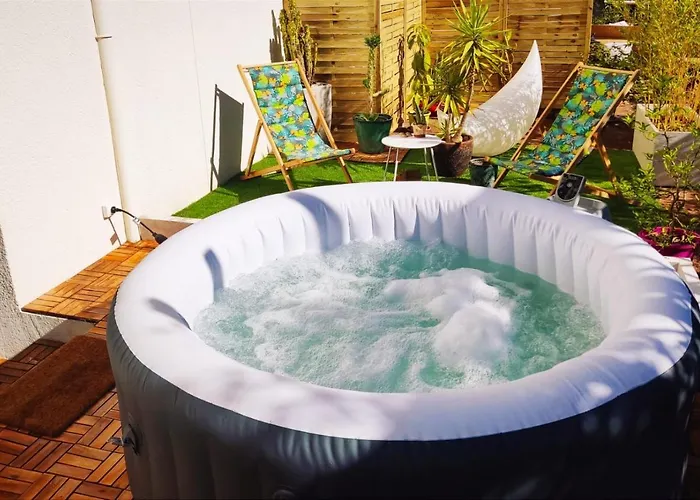 Superbe appartement avec jacuzzi avec jardin privé